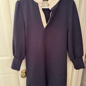 Tucker buck: Pomander Place Navy Dress with Cream Ruffle Collar